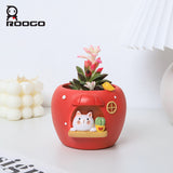 Animal House apple orange flower pot